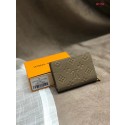 Replica Louis Vuitton Original Monogram Empreinte CLEA WALLET M80152 Tourterelle Beige JK158nB47